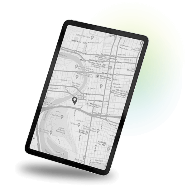 a tablet with a google map of columbus with a location pin pointing to a local business in the center