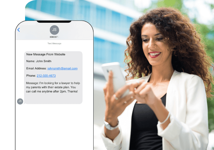 A female lawyer smiling at a lead texted to her phone from her website.